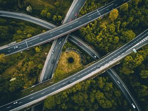 Interstates cut through swaths of forest.