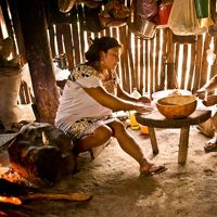 in a family cooking hut at the ejido Veinte de Noviembre in in the lush Maya Forest of Mexico's Yucatan Peninsula. 