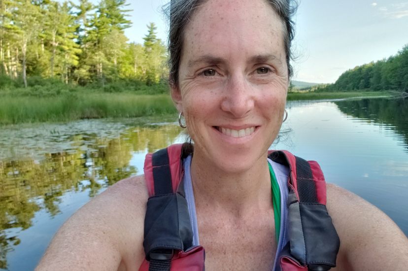 Samantha Horn, Director of Science for TNC in Maine, kayaks on Hopkins Stream in Maine, where she looks for turtles, fish, and birds.