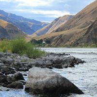 A river winds through a rocky canyon.